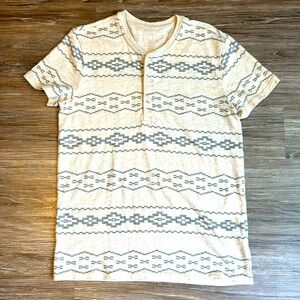 Soft jersey. Short sleeves. Crewneck. Allover Southwestern-print stripes. Size M